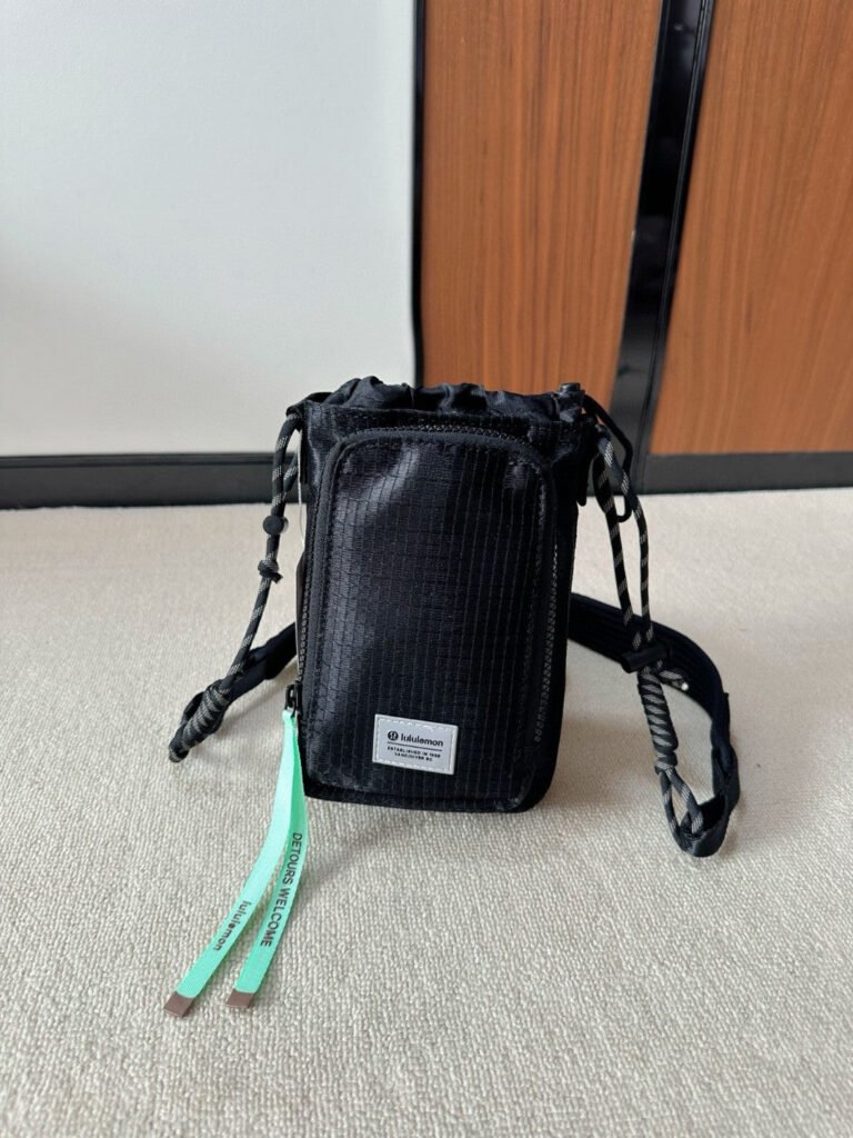 Lululemon Inspired water Crossbody with front pocket paracord